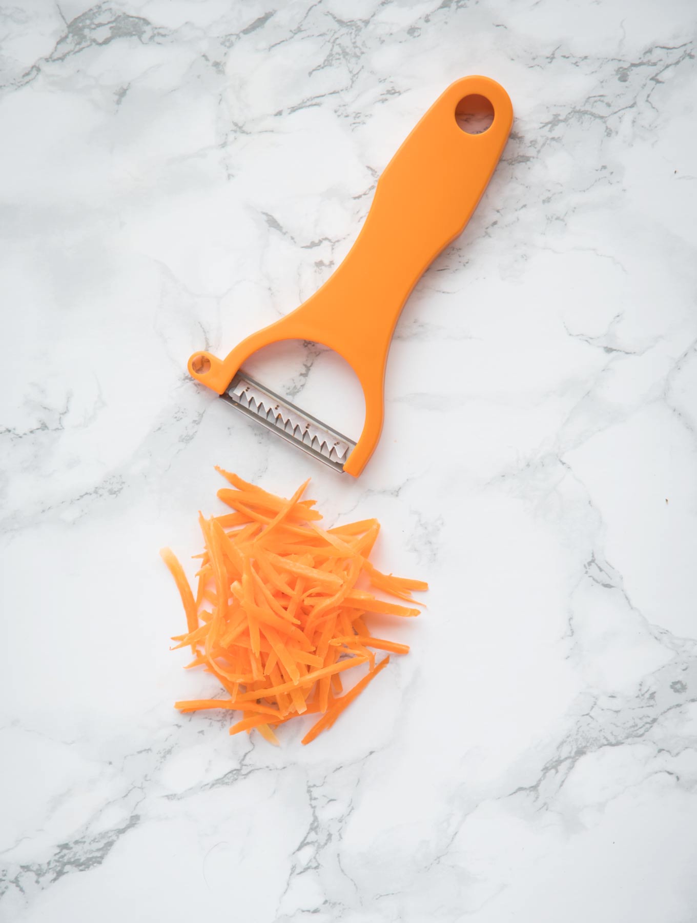 Carrots cut with a julienne cutting tool.