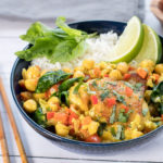 Bowl of coconut curry chicken and rice