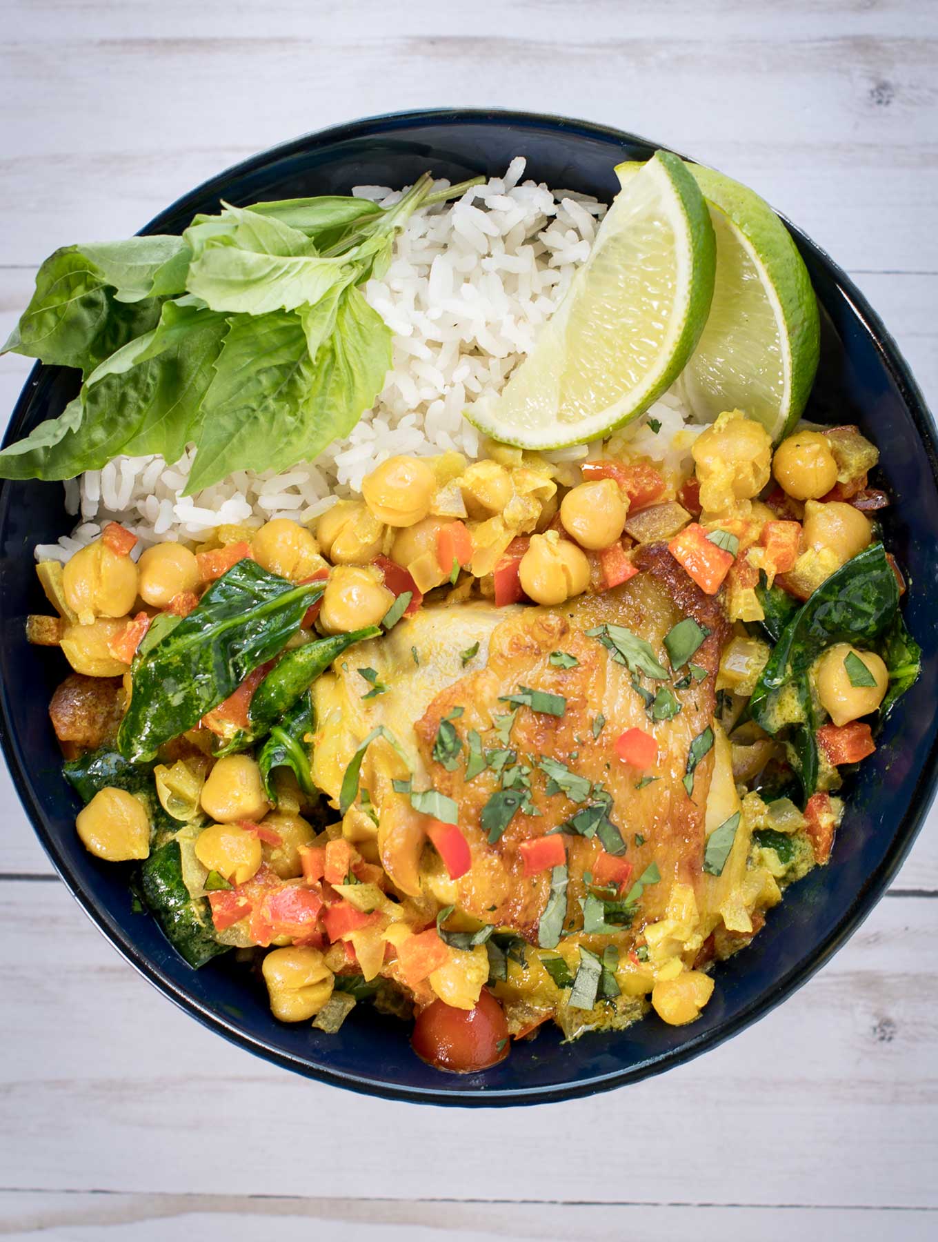 Bowl of coconut curry chicken and rice