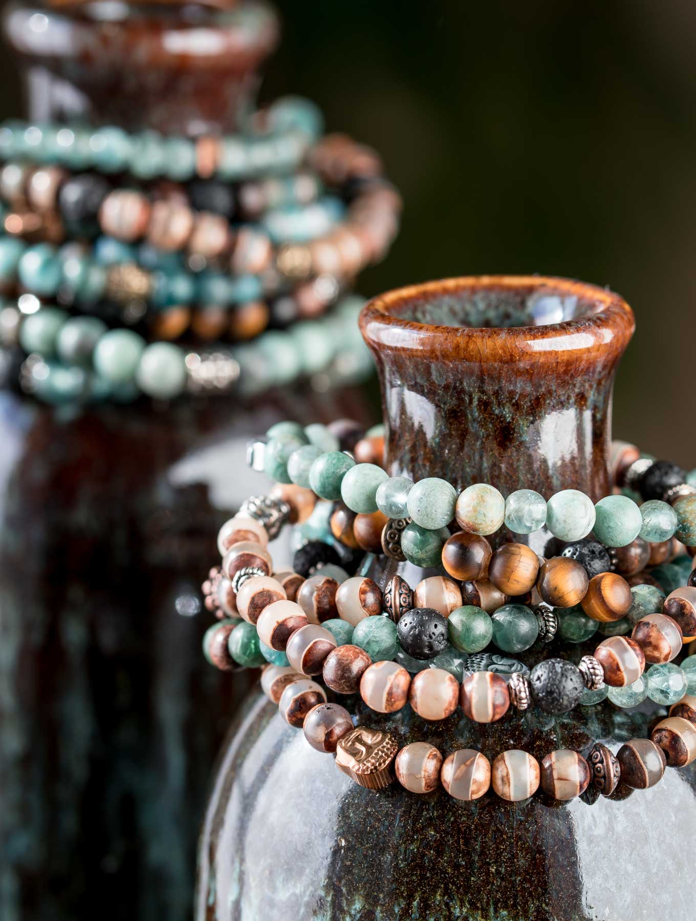 Essential oil diffuser bracelets on a bottle