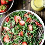 Bowl of Strawberry Kale Salad with Lemon Basil Dressing