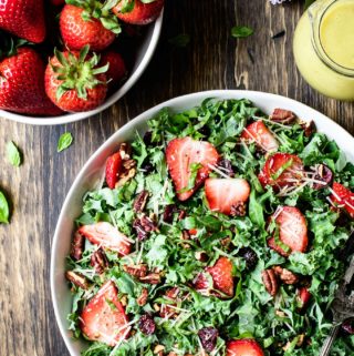 Bowl of Strawberry Kale Salad with Lemon Basil Dressing