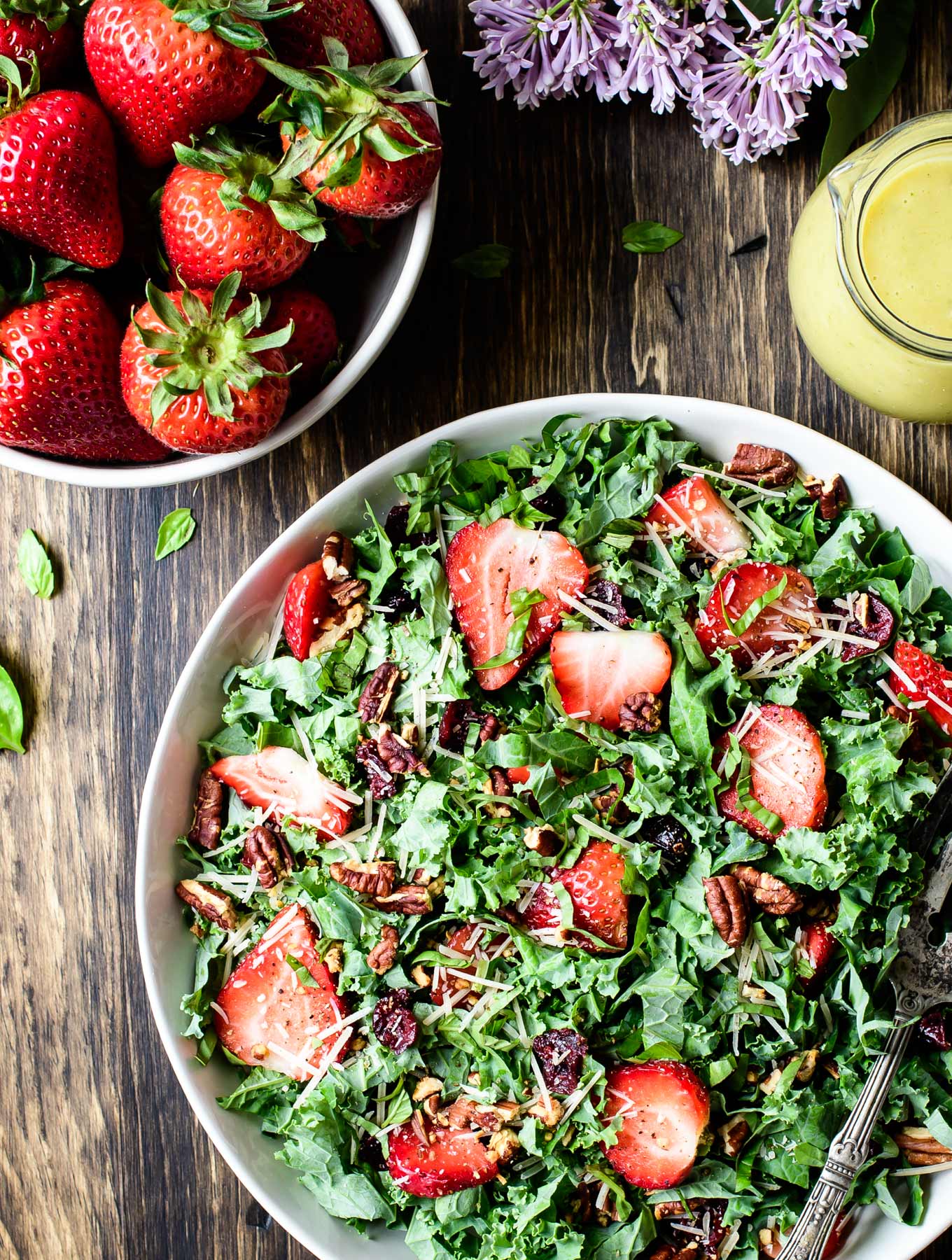 Bowl of Strawberry Kale Salad with Lemon Basil Dressing