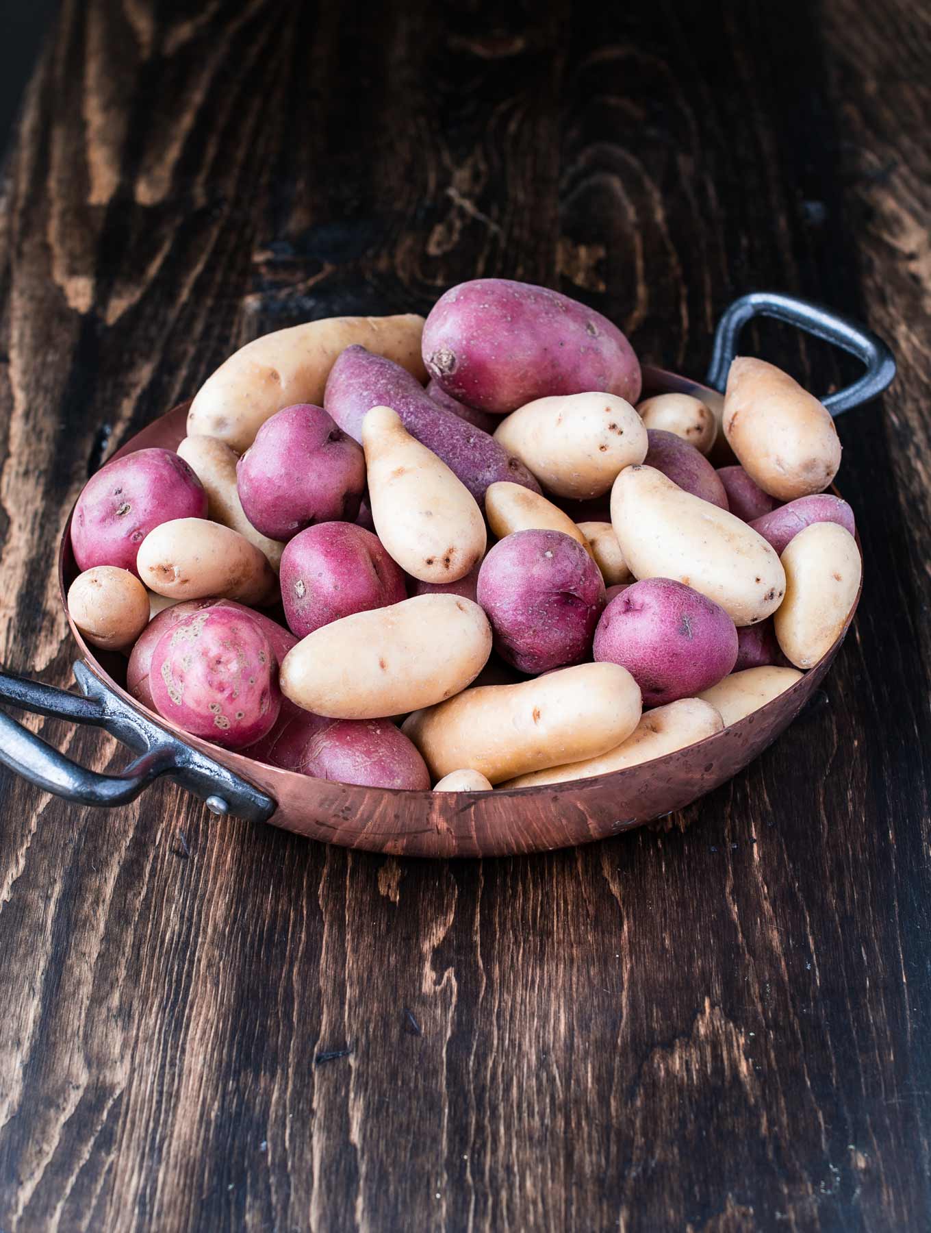 Copper bowl of potatoes