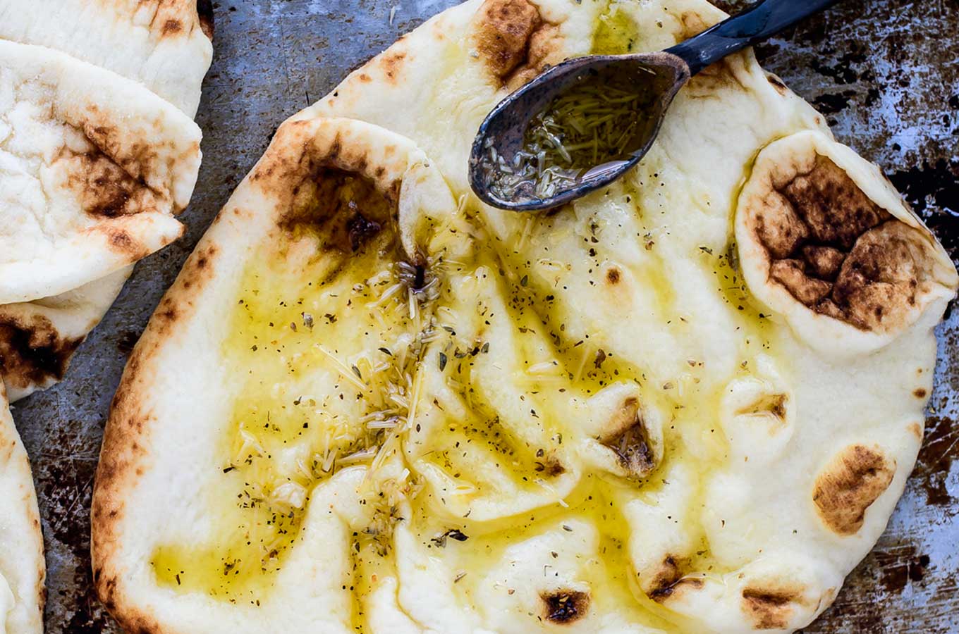 Naan bread with olive oil and parmesan