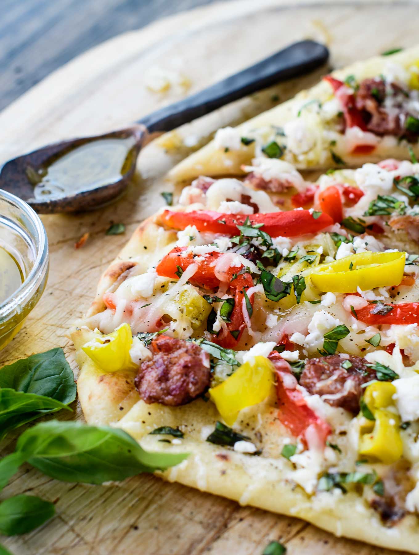 Close up of mediterranean flatbread pizza