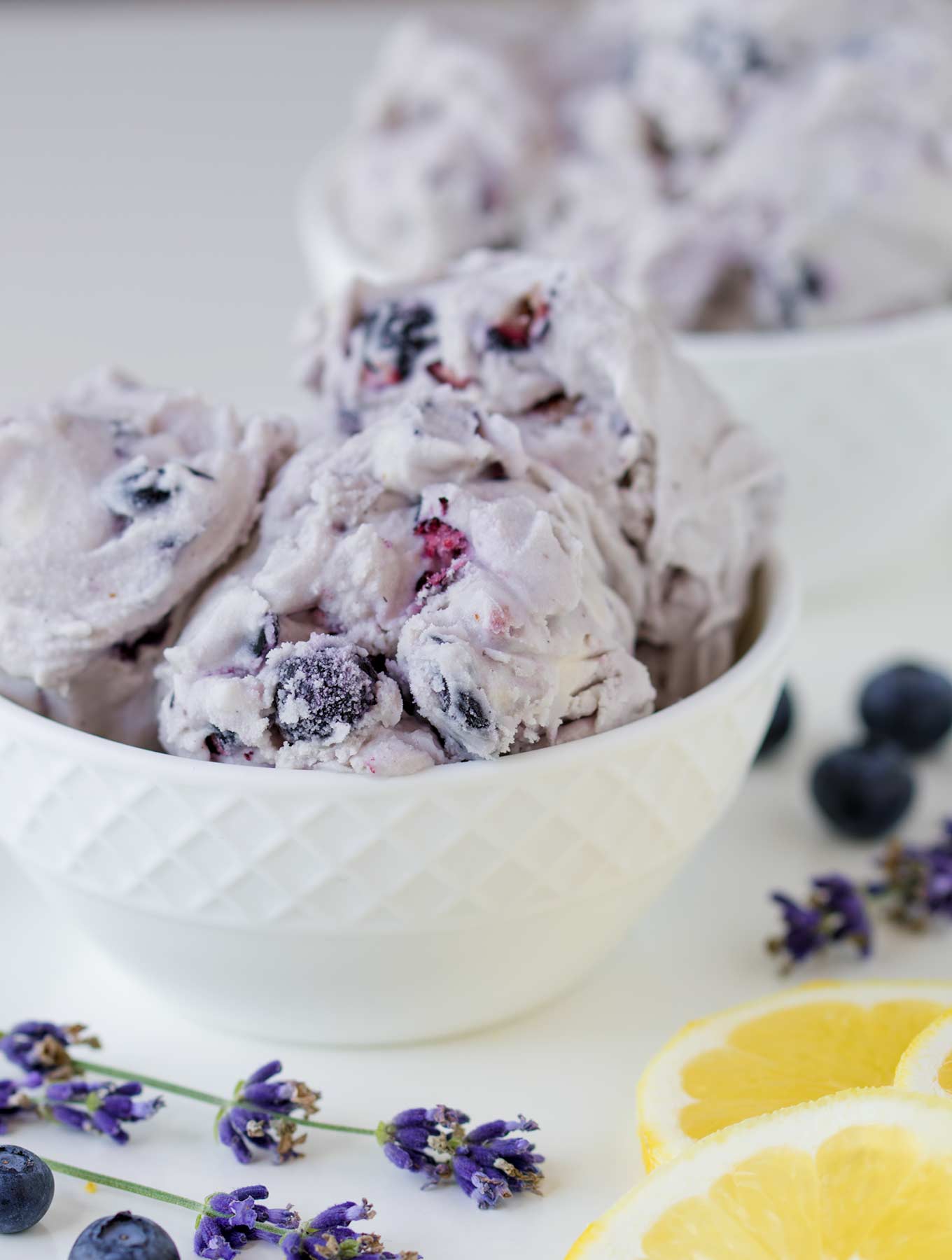 A bowl of lavender blueberry lemon ice cream