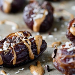 Dates stuffed with almond butter, coconut, cacao nibs and smoked salt.