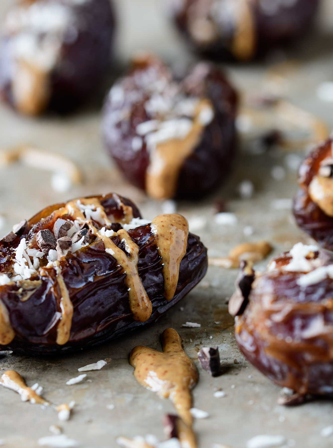 Dates stuffed with almond butter, coconut, cacao nibs and smoked salt.