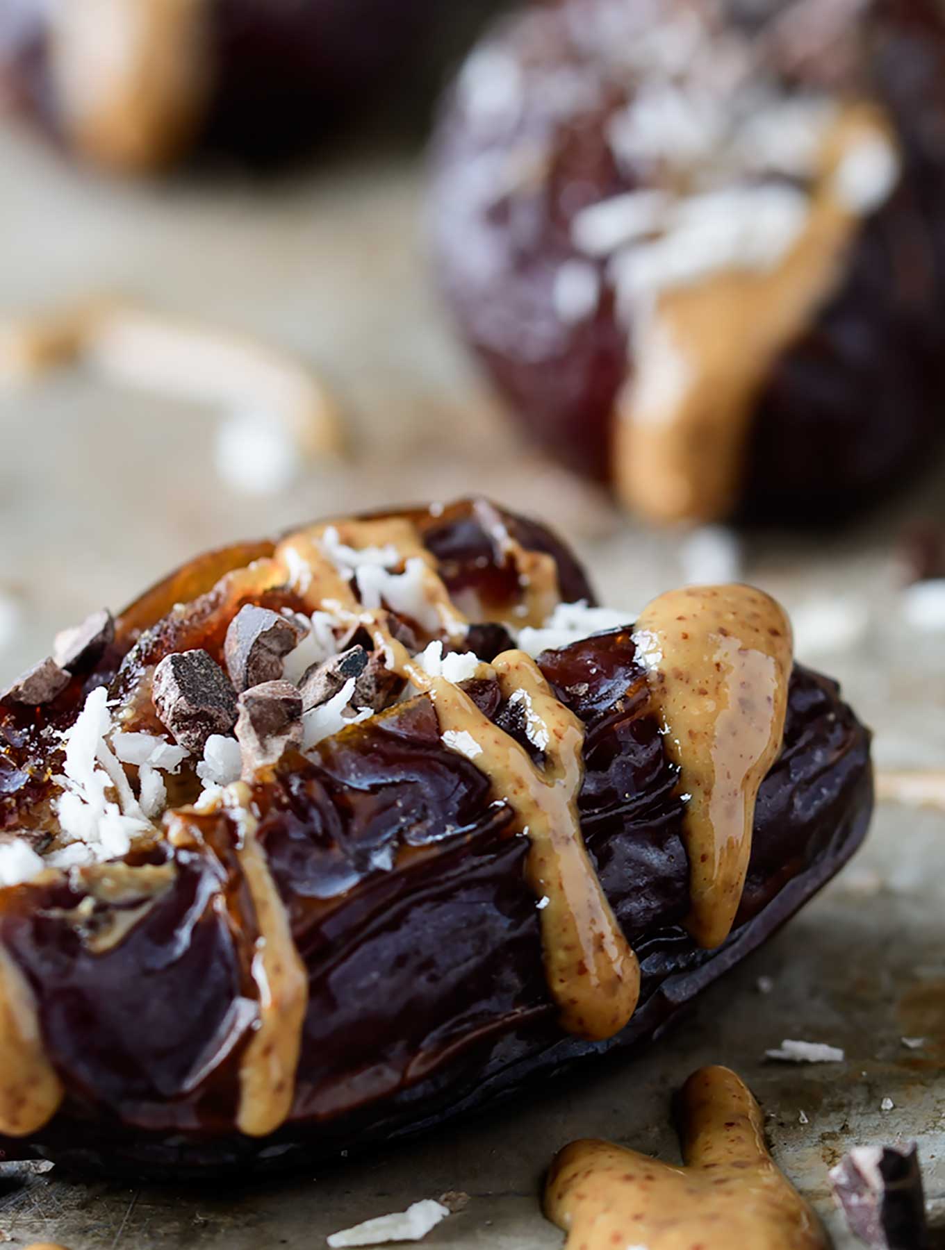 Dates stuffed with almond butter, coconut, cacao nibs and smoked salt.