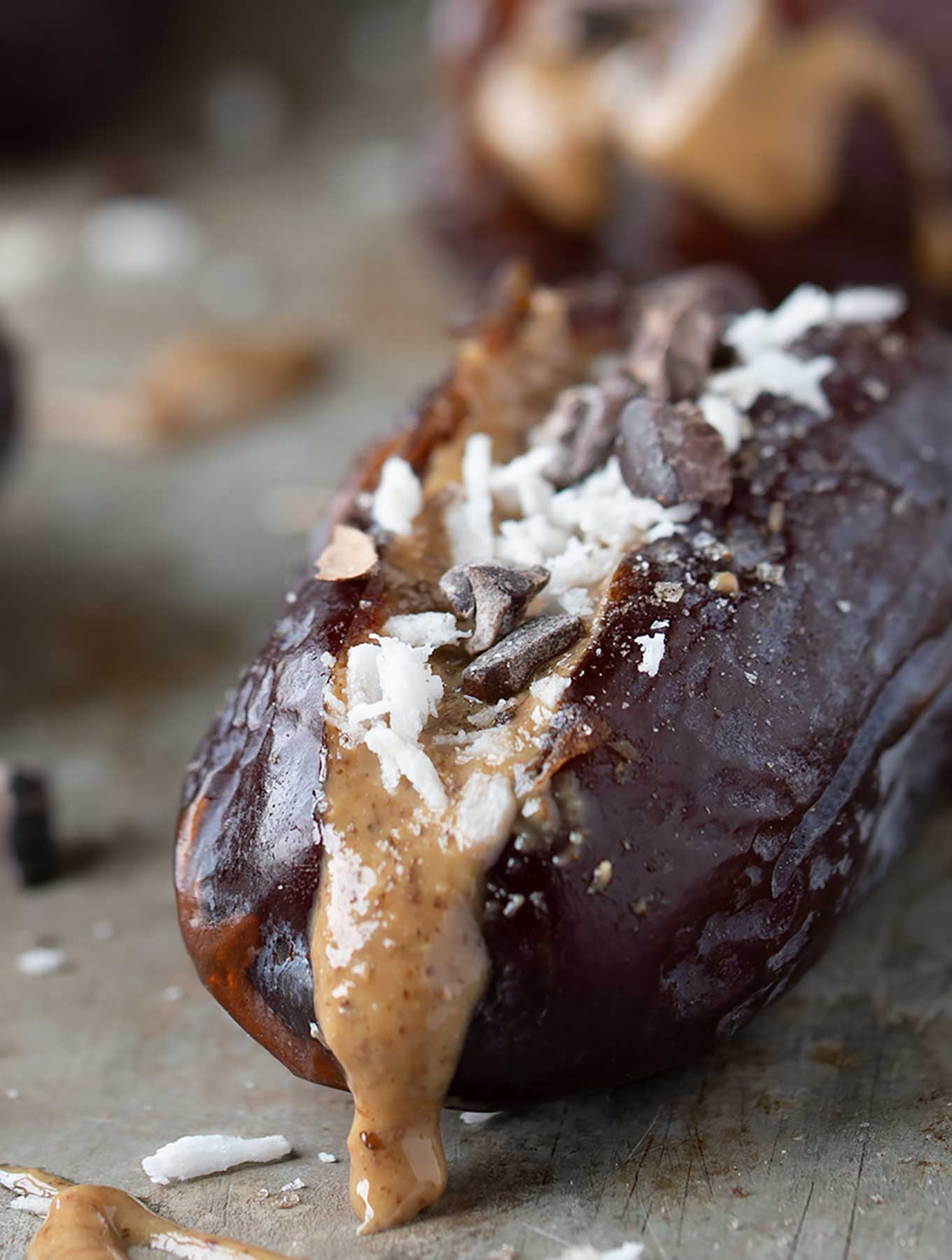 Dates stuffed with almond butter, coconut, cacao nibs and smoked salt.