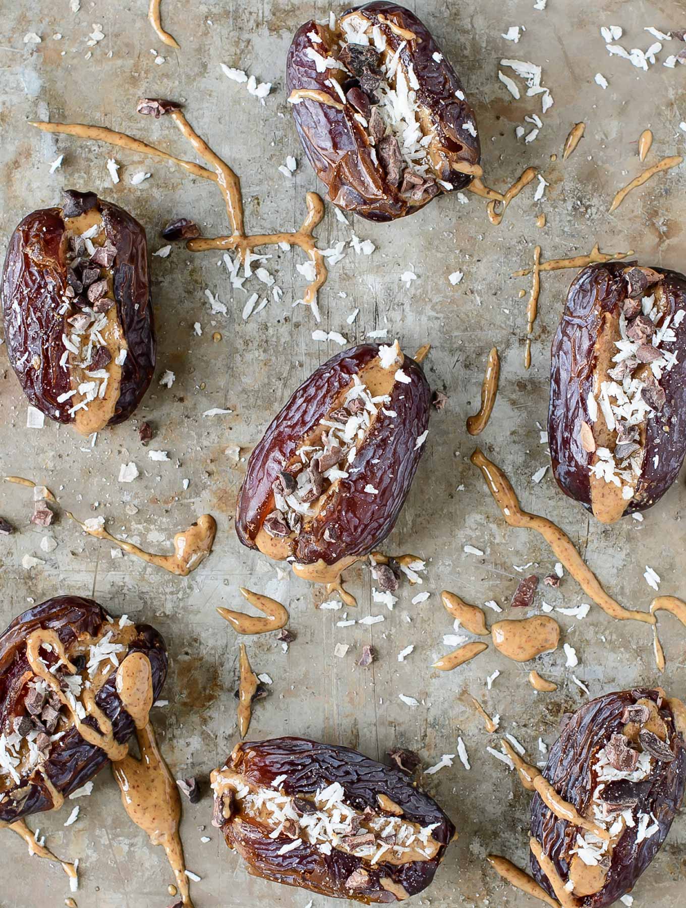 Dates stuffed with almond butter, coconut, cacao nibs and smoked salt.