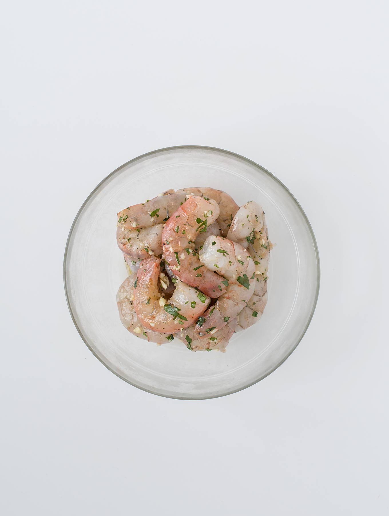 Bowl of raw shrimp in marinade