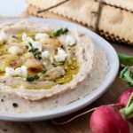 Bowl of roasted garlic bean dip