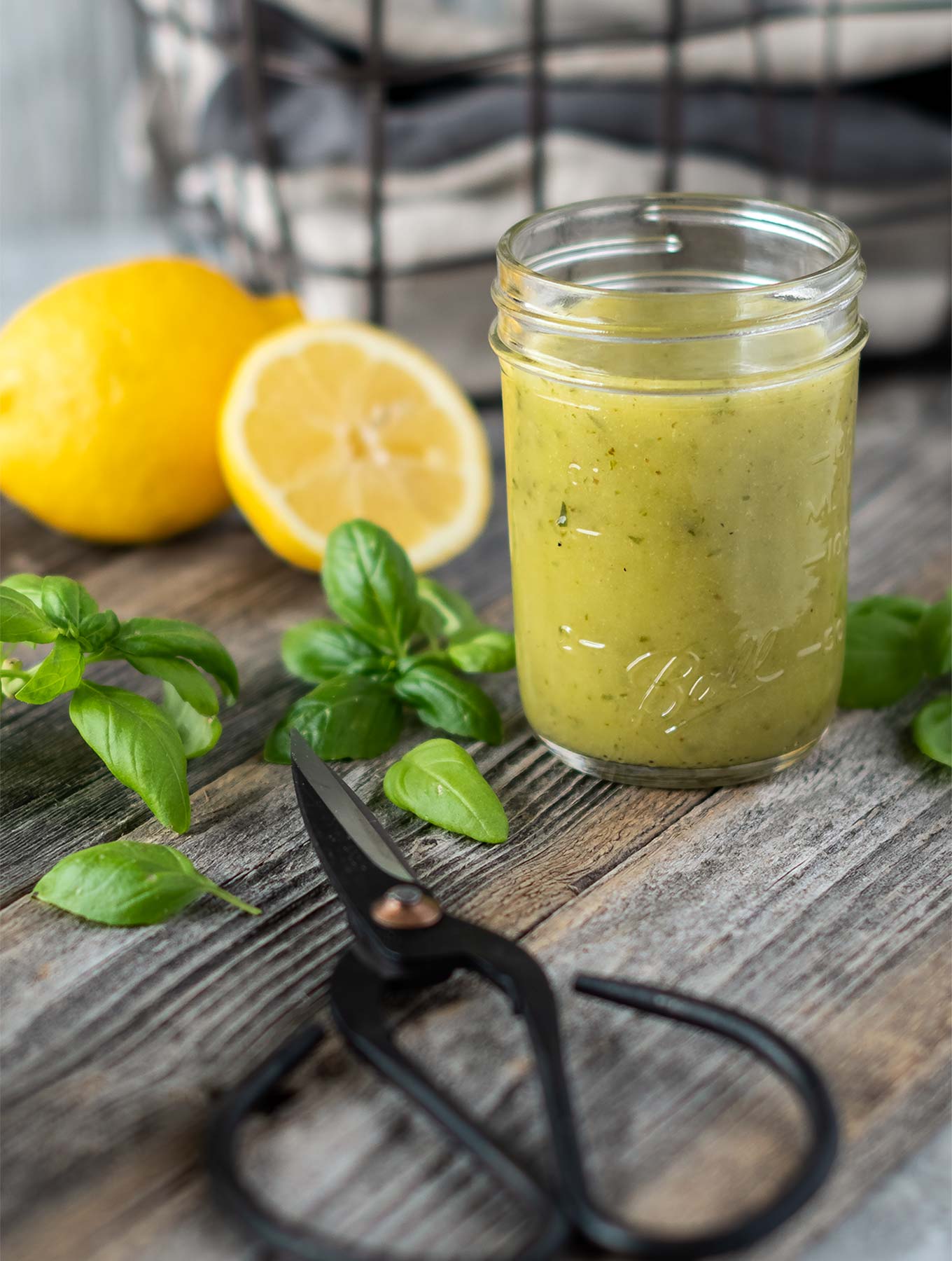 Lemon basil dressing with fresh basil and lemons