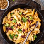 Skillet of pasta with sun dried tomatoes and broccoli