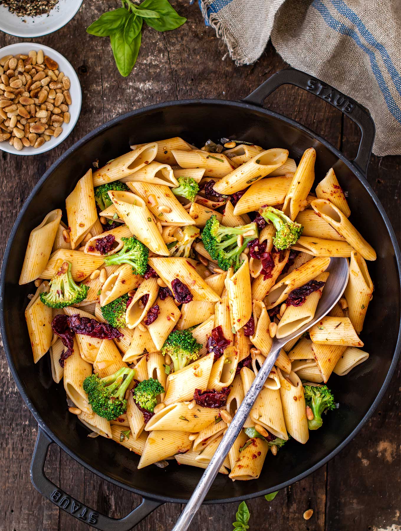 Skillet of pasta with sun dried tomatoes and broccoli